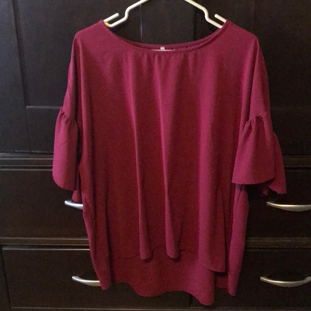 Red top with ruffle sleeves